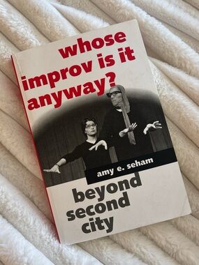 Whose Improv Is It Anyway? by Amy E. Seham - Paperback Book, Red & White Cover